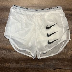 White Nike shorts